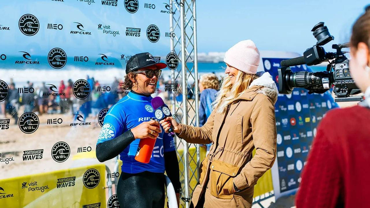 Surfer being interviewed after their heat.