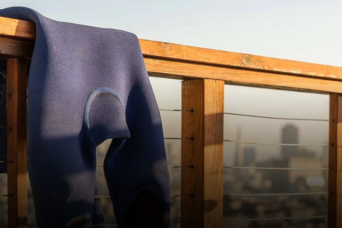 Wetsuit hanging over a balcony